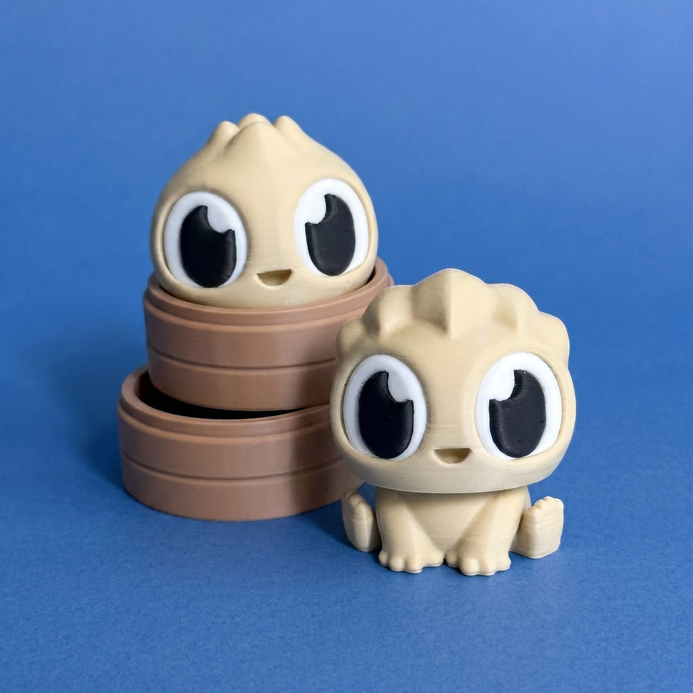 Momo and Bao the dumpling buddies with their bamboo steamer baskets