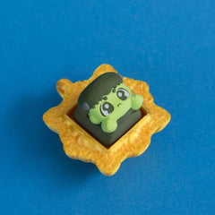 Boltsy the frankenstein keycap in gold frame clicker.