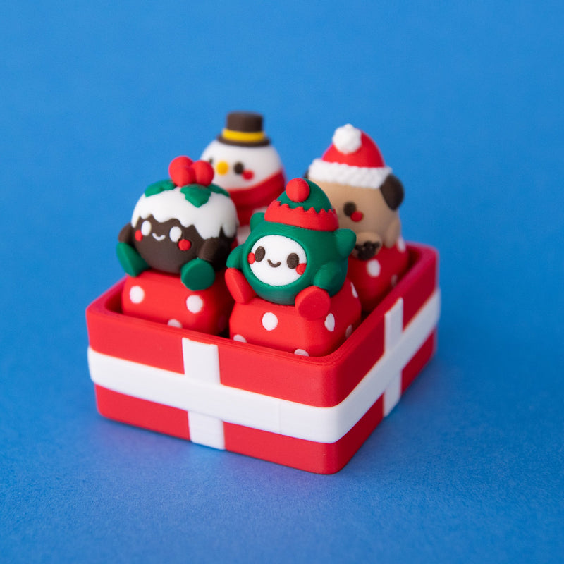 Red four-slot gift box clicker base filled with Christmas pudding, elf, snowman and Santa puppy keycaps