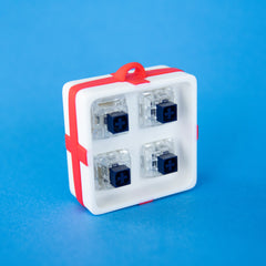 White four-slot gift box base with four clicky switches fitted