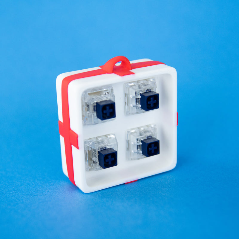 White four-slot gift box base with four clicky switches fitted