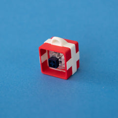 Red single gift box base with a switch fitted, angled view