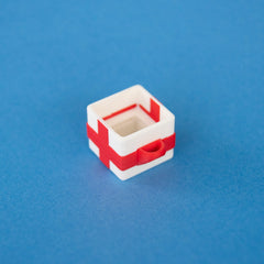 Empty white single gift box clicker base, angled view
