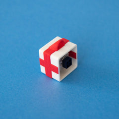 White single gift box base with a switch, side view showing the ribbon