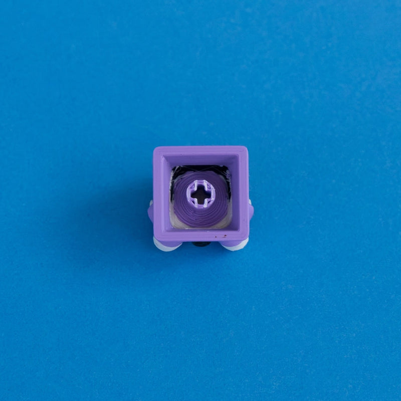 Fangy the vampire after dinner keycap underside MX stem front.
