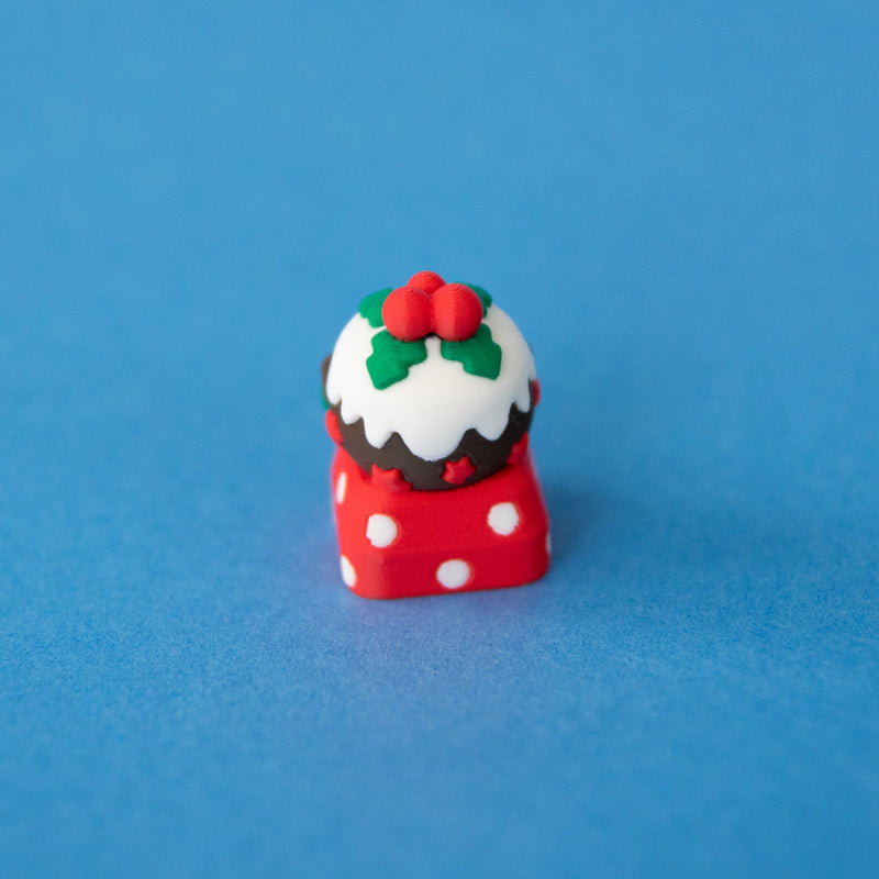 Back of Figgy the Christmas pudding keycap, showing the icing and holly