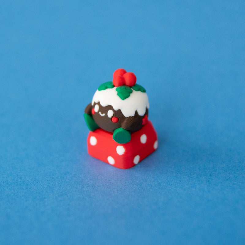Figgy the Christmas pudding keycap, three-quarter view from the left