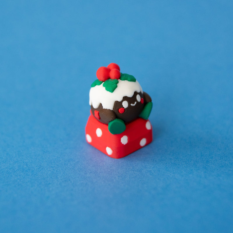 Figgy the Christmas pudding keycap, three-quarter view from the right