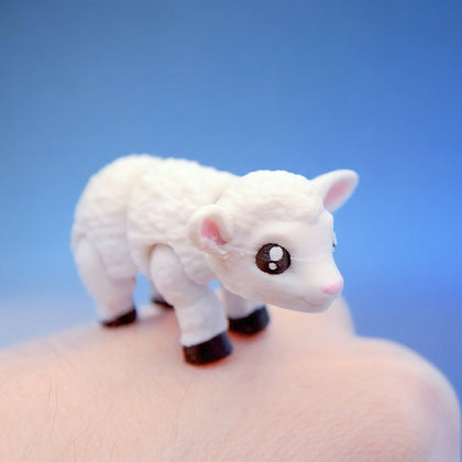 White woolly sheep fidget toy with pink ears and black hooves, standing side-on