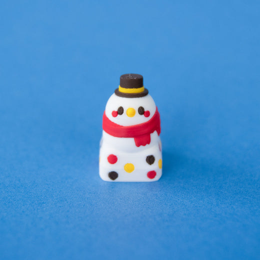 Flurry the snowman Christmas keycap from a low front angle