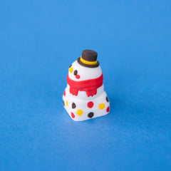 Flurry the snowman keycap, three-quarter view from the left