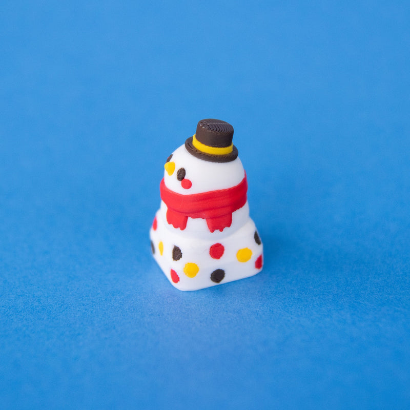 Flurry the snowman keycap, three-quarter view from the left