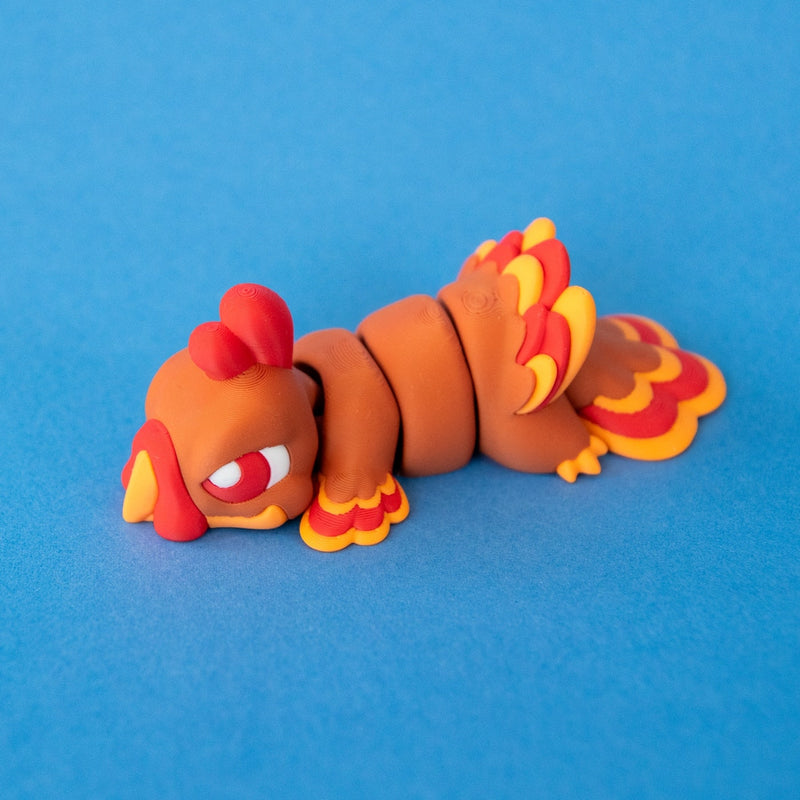 Gobb the Turkey Beastchonk in front three-quarter view, showing his face, articulated body and feathered tail.