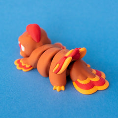 Rear three-quarter view of Gobb the Turkey Beastchonk, showing his wings and layered tail feathers.