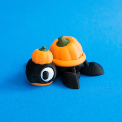 Gourdon pumpkin turtle clicker front right view.