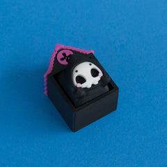 Grimsy the reaper keycap in Hollow Lane single clicker house.