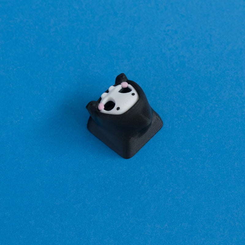 Grimsy the reaper keycap three quarter view.