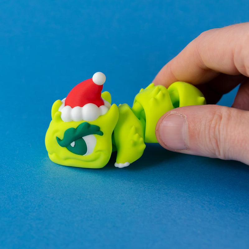 Grump the Humbug Chonk held in hand, front view