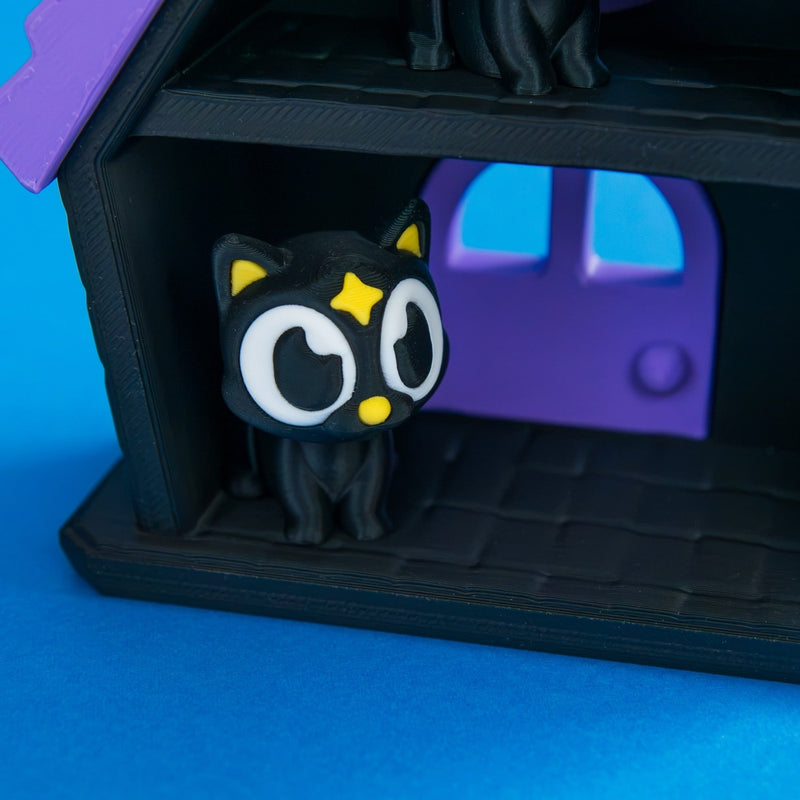 Haunted cat house bundle luna moon cat close up.