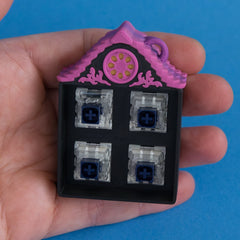 Hollow Lane four slot clicker house four switches front view.