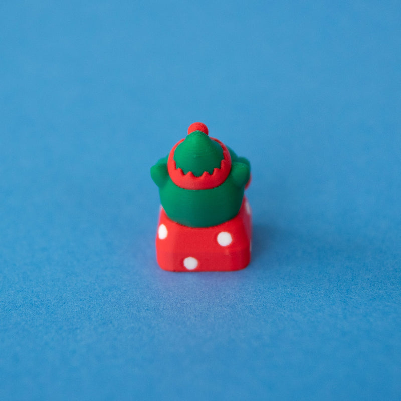 Back of Jingle the elf keycap, showing the hat bobble