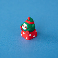 Jingle the elf Christmas keycap, three-quarter view from the left