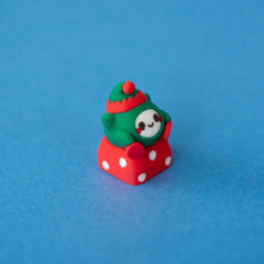 Jingle the elf keycap, three-quarter view from the right