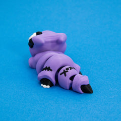 Kawaii Goth Reapo's articulated tail with cross stitches, rear view