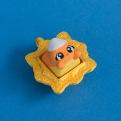 Kernie the candy corn keycap in gold frame clicker.