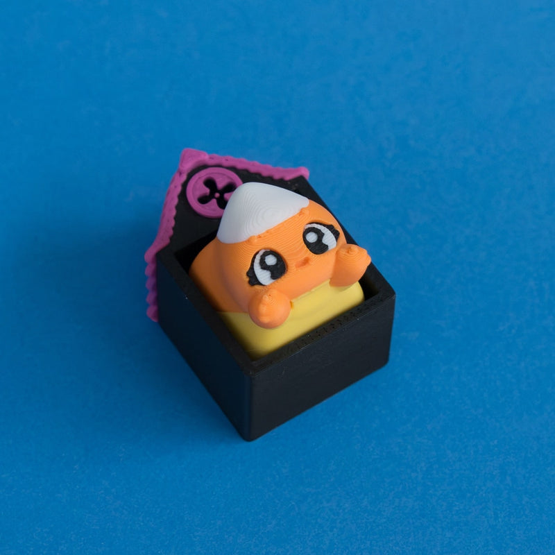 Kernie the candy corn keycap in Hollow Lane single clicker house.
