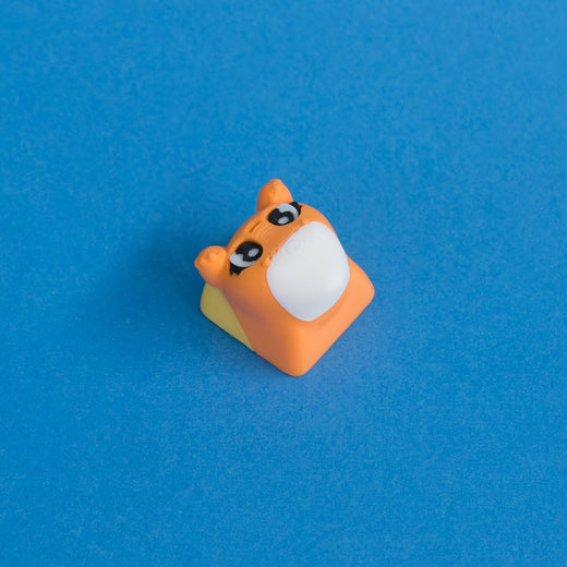 Kernie the candy corn keycap three quarter view.