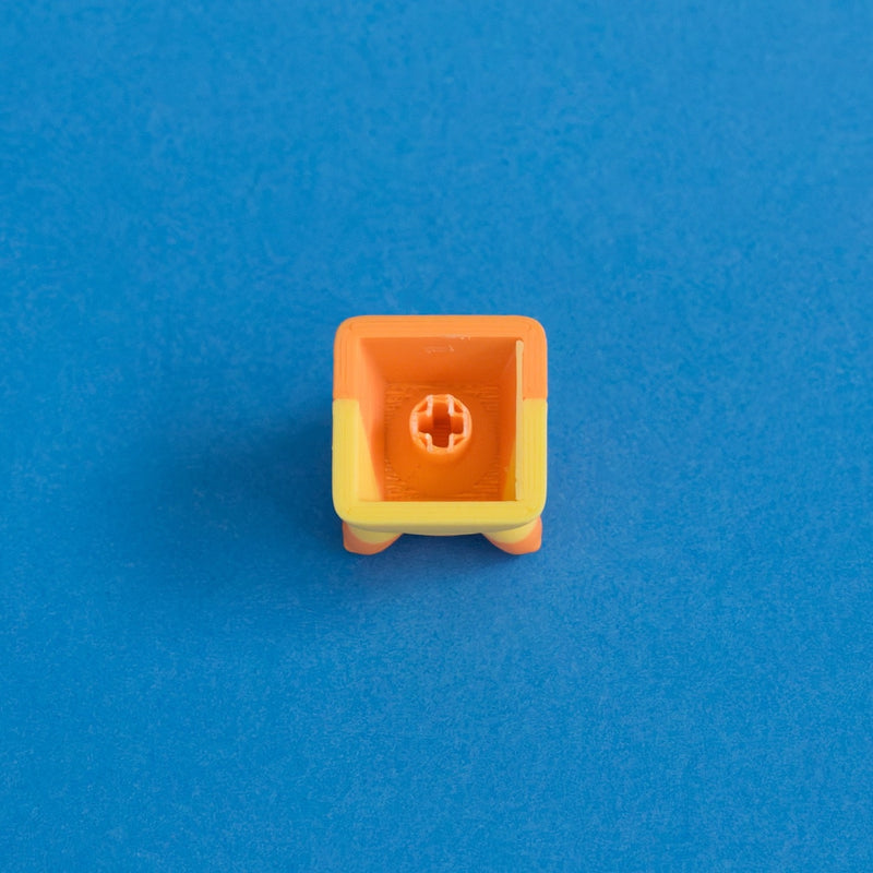 Kernie the candy corn keycap underside MX stem.