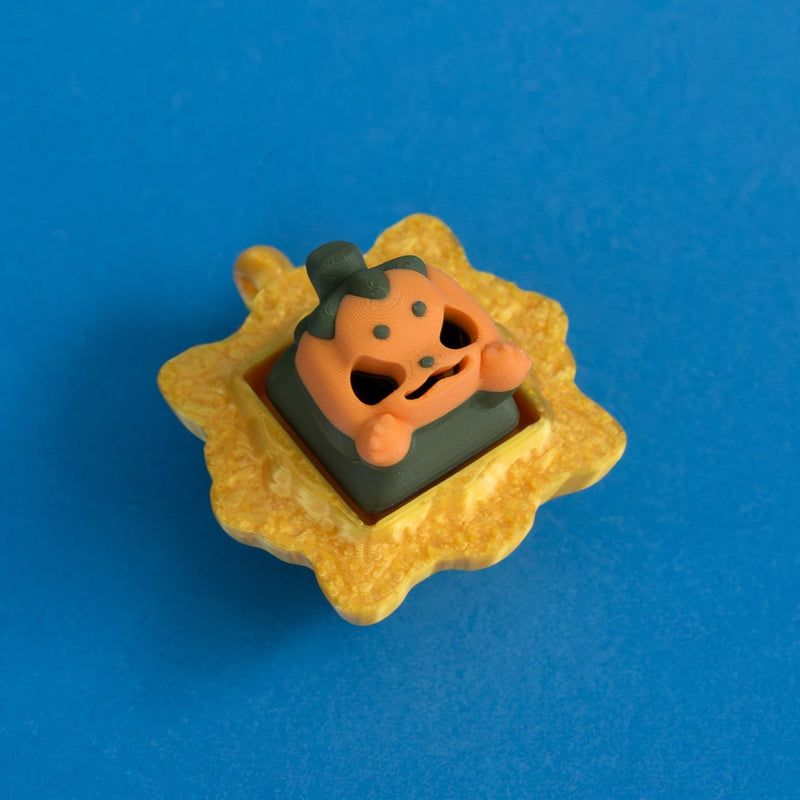 Lanty the pumpkin keycap in gold frame clicker.