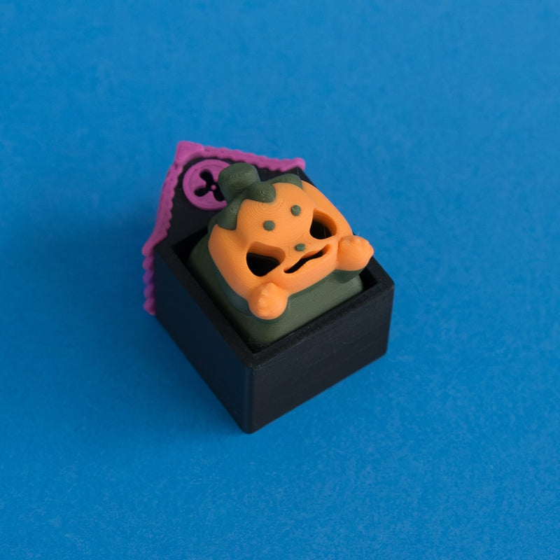 Lanty the pumpkin keycap in Hollow Lane single clicker house.