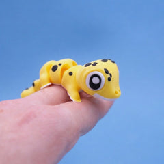 Close-up of Leo the leopard gecko fidget toy's spotted body and large eye