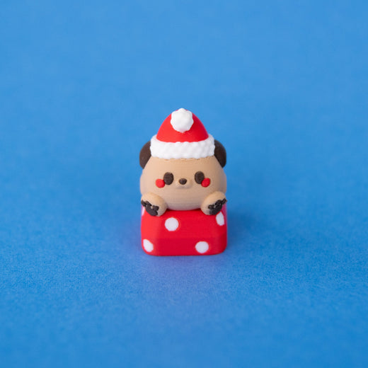 Nutmeg the Santa puppy Christmas keycap with rosy cheeks, front view