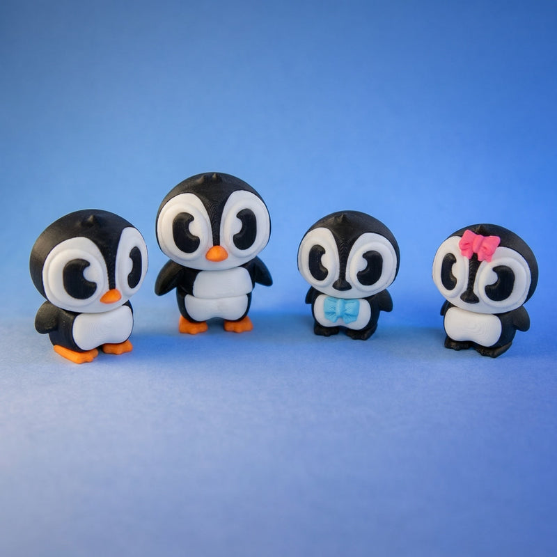 The four penguin figurines arranged in an alternate group pose on a blue background.