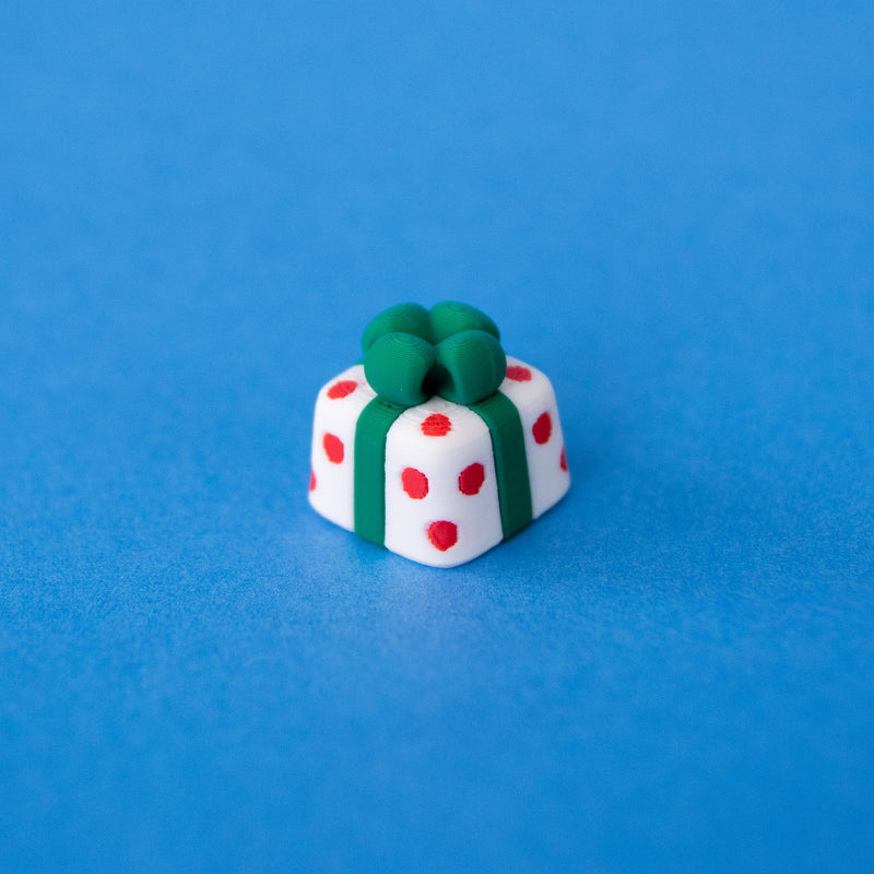Polka the spotted present Christmas keycap, corner view