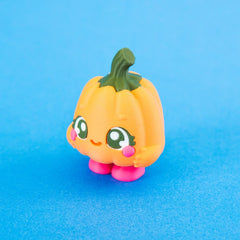 Posie from a front three-quarter angle with her face and rounded pumpkin shape visible.