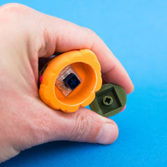 Close view of Posie's underside showing the switch cavity.