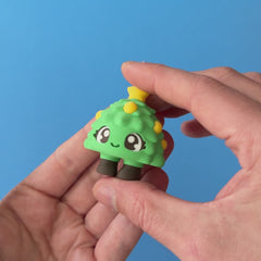 Tannen the Christmas Tree Clicker pressed and released, with the original mechanical click sound