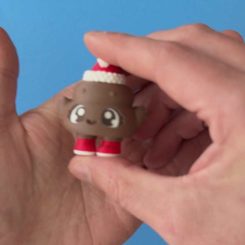 Poopie the Christmas Clicker pressed and released, with the original mechanical click sound