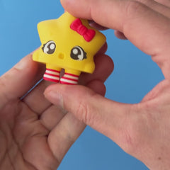 Stella the Christmas Star Clicker pressed and released, with the original mechanical click sound