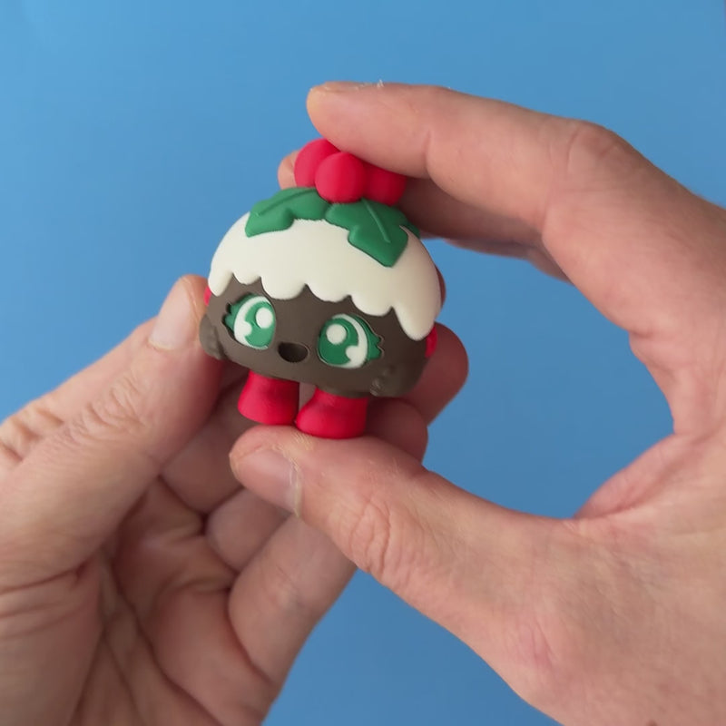 Plum the Christmas Pudding Clicker pressed and released, with the original mechanical click sound