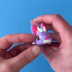 Bonfire the Bunny Dragon 3D printed fidget wiggling in hand