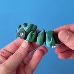 Bunkle the Beetle Drakeling 3D printed fidget wiggling in hand
