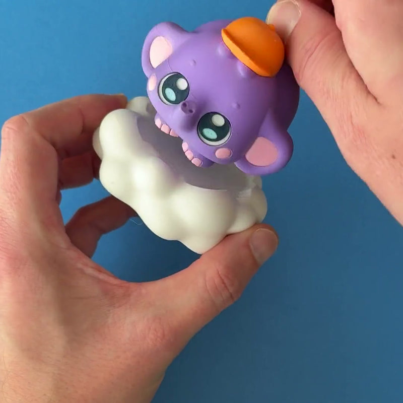 Cappy the Cloud Stompy 3D printed fidget wiggling in hand