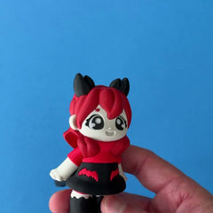 Cherry the Scorpio Girl 3D printed fidget wiggling in hand