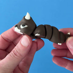 Dozer the Bull Chonk Dragon 3D printed fidget wiggling in hand