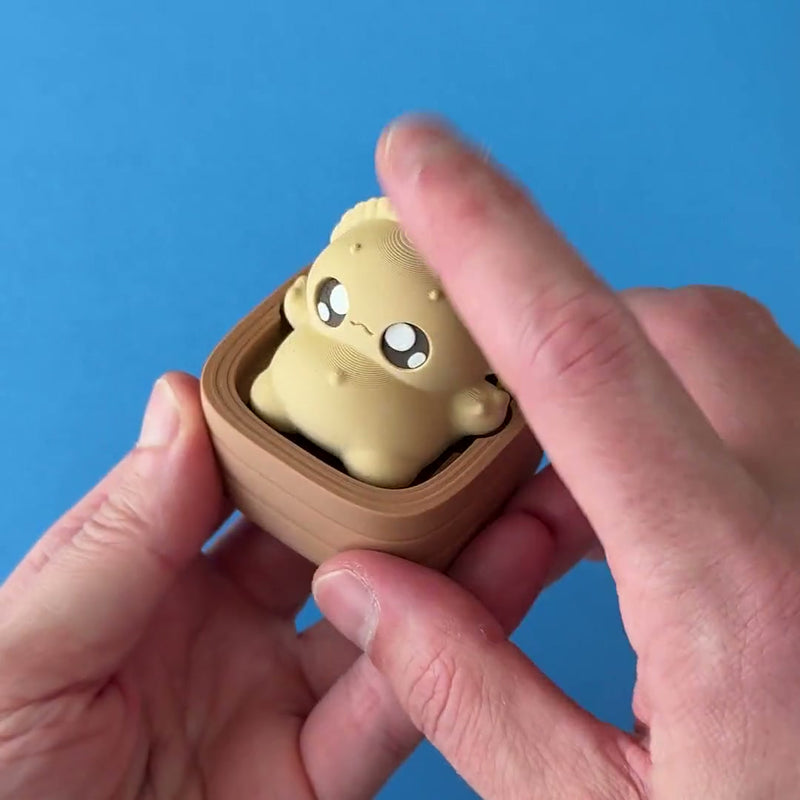 Dumpling Boo Clicker 3D printed fidget wiggling in hand